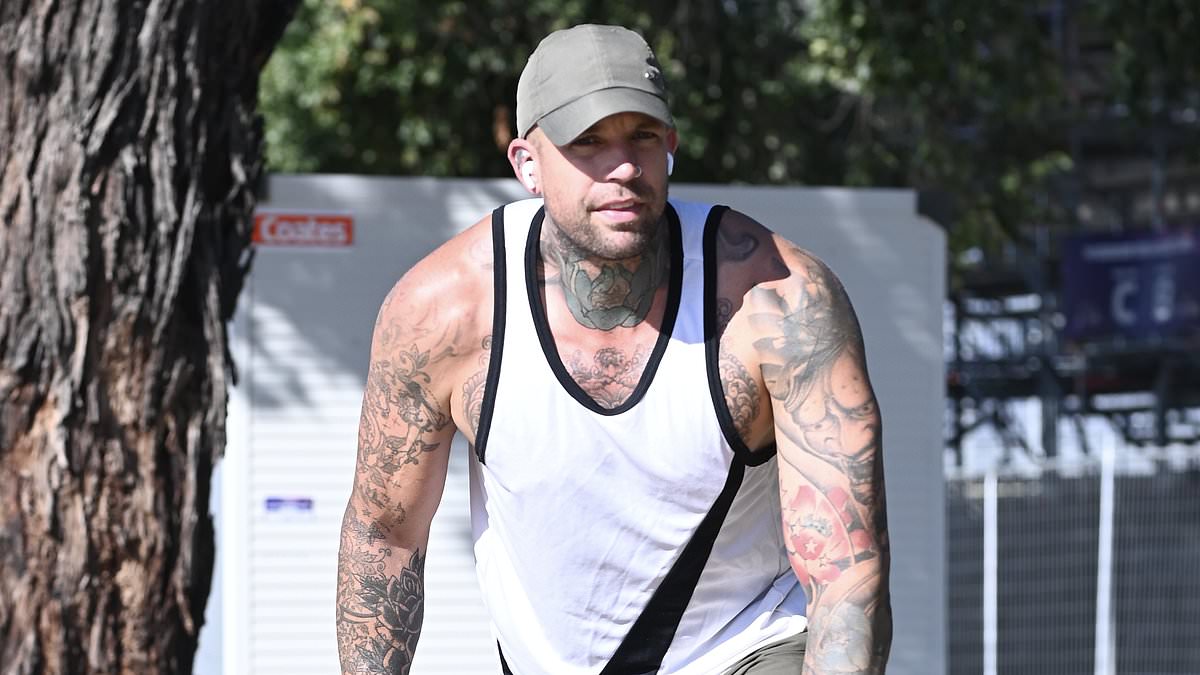 alert-–-mafs’-dave-hand-shows-off-his-tattoos-in-a-singlet-as-he-enjoys-a-sun-soaked-day-out-in-melbourne-with-his-beloved-dog-willow