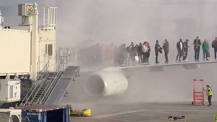 alert-–-american-airlines-plane-erupts-in-flames-at-denver-airport-as-terrified-passengers-are-forced-to-escape-onto-wing