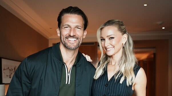 alert-–-bachelor-stars-tim-robards-and-wife anna-heinrich-cut-very-glamorous-figures-as-they-enjoy-a-kid-free-date-night-at-the-f1-grand-prix