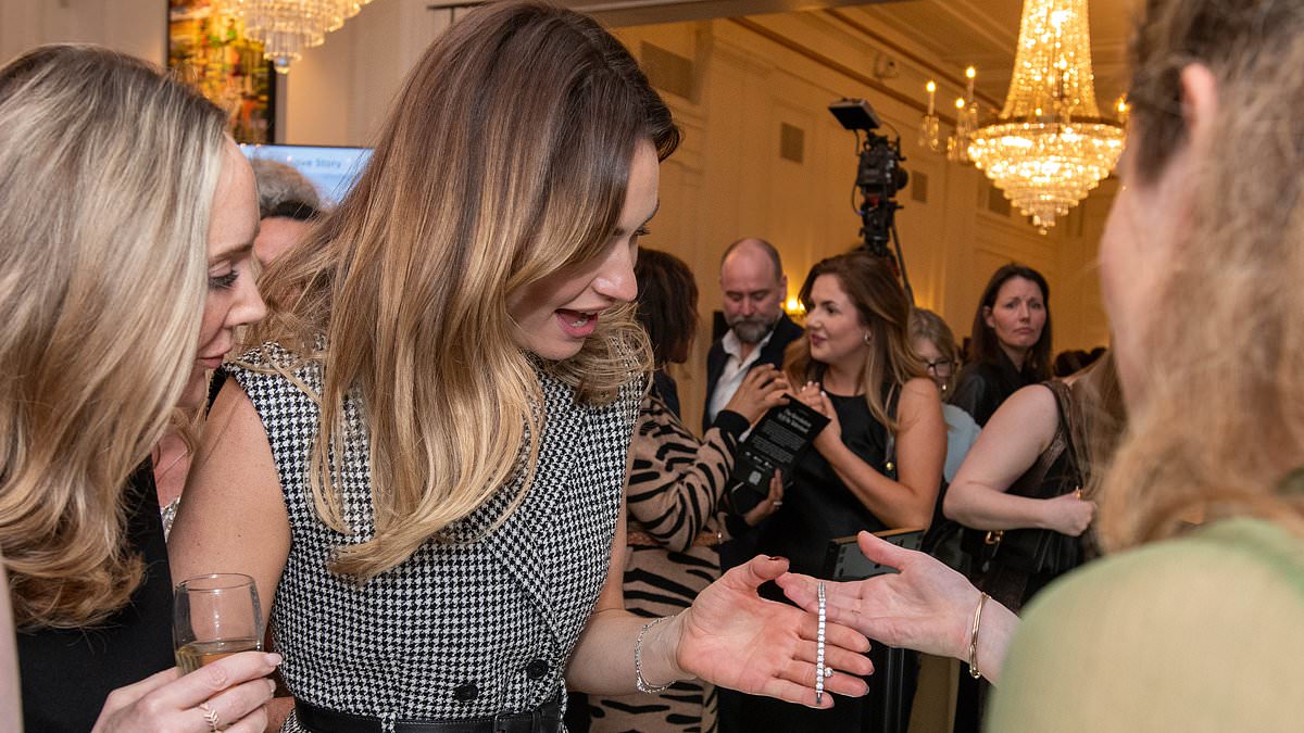 alert-–-lily-james-is-epitome-of-sophistication-in houndstooth-blazer-dress-as-she-tries-on-glittering-gems-at-natural-diamond-council-event-in-london