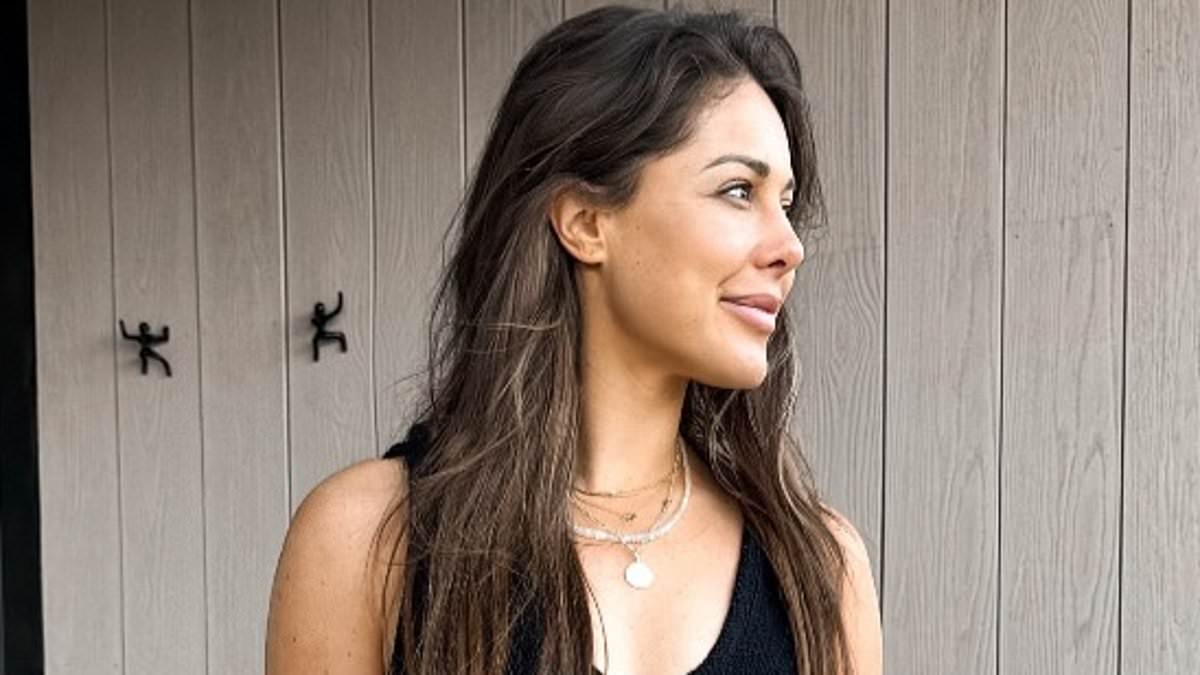 alert-–-louise-thompson-flaunts-her-incredible-figure-in-a-frilly-black-swimsuit-as-she-enjoys-relaxing-countryside-getaway