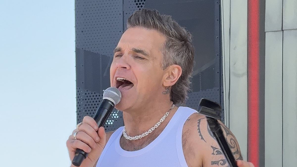 alert-–-robbie-williams-speaks-candidly-about-the-pressures-of-being-a-celebrity-as-he-reveals-how-fans-asking-for-selfies-can-cause-him-to-‘panic’