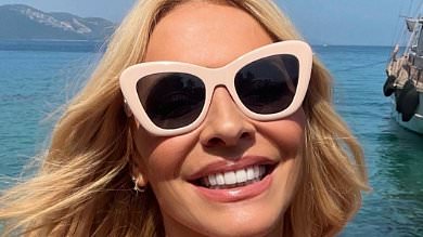 alert-–-tess-daly,-56,-dazzles-in-pink-swimsuit-and-golden-two-piece-after-jetting-off-to-turkey-to-model-her-new-collection
