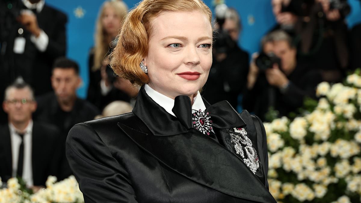 alert-–-succession-star-sarah-snook-looks-regal-in-a-black-suit-with-dramatic-cape-as-she-attends-the-2025-met-gala