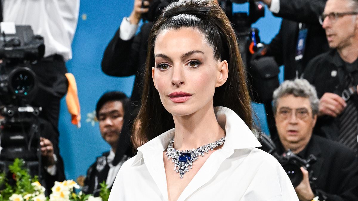 alert-–-anne-hathaway-continues-fueling-plastic-surgery-rumors-as-fans-react-to-her-smooth-new-face-at-2025-met-gala