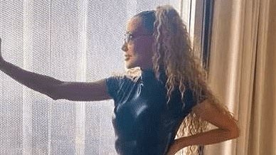 alert-–-90s-pop-star,-55,-hasn’t-aged-a-day-as-she-poses-in-racy-leather-catsuit-–-but-can-you-guess-who-she-is?
