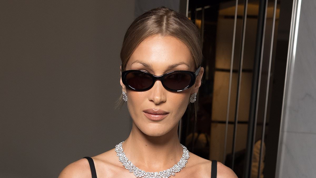 alert-–-bella-hadid-exudes-elegance-in-a-black-midi-dress-as-she-debuts-a-chic-new-look-for-second-event-of-the-night -–-after-going-braless-at-the-78th-cannes-film-festival