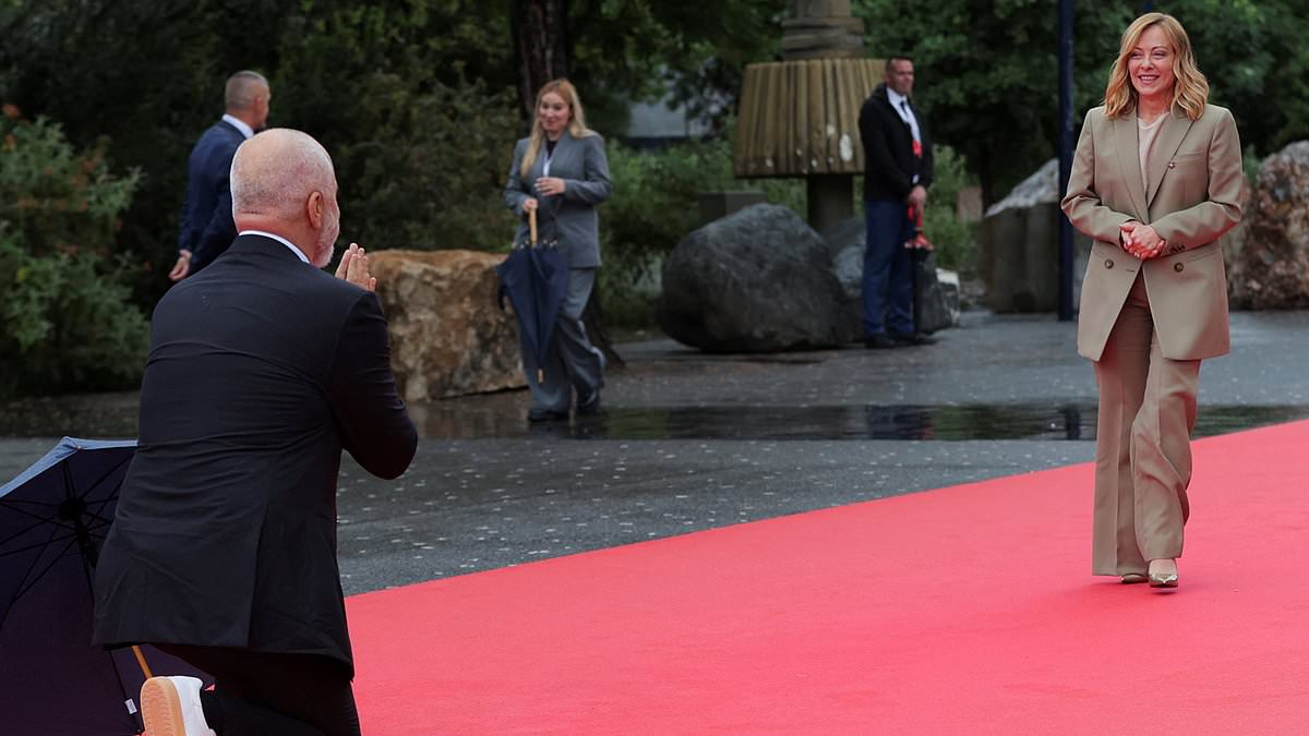 alert-–-quite-the-contrast!-moment-albania’s-6ft-7in-prime-minister-gushingly-takes-a-knee-as-he-meets-italy’s-5ft-3in-pm-–-days-after-towering-over-keir-starmer-during-their-meeting-in tirana