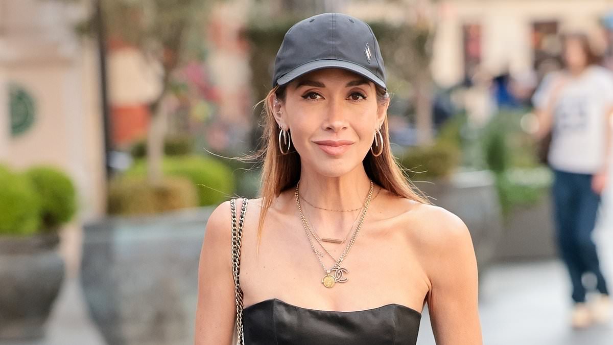 alert-–-myleene-klass-showcases-her-very-svelte-figure-in-a-black-corset-top-as-she-steps-out-at-smooth-radio