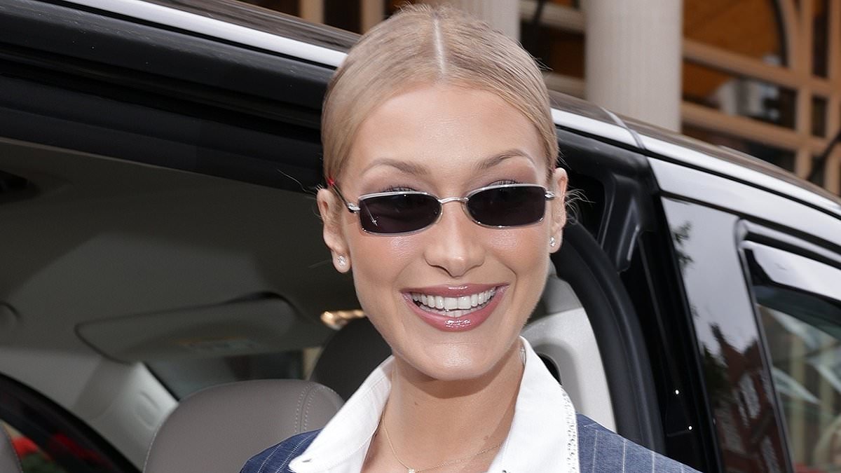 alert-–-bella-hadid-turns-heads-in-a-sophisticated-pinstripe-dress-as-she-launches-her-new-fragrance-orebella-at-selfridges-in-london