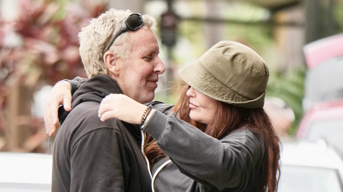 alert-–-schapelle-corby-embraces-mystery-man-at-gold-coast-airport-–-after-sparking-engagement-rumours