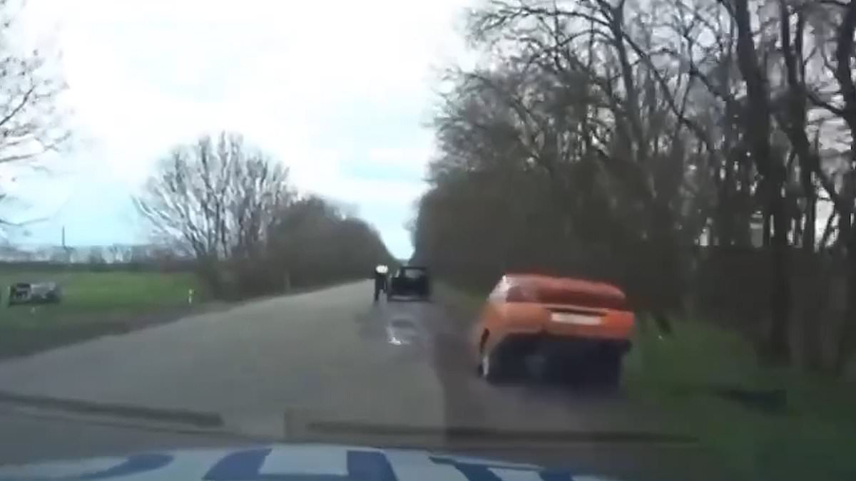 alert-–-time-to-split!-motorist-escapes-after-cop-pulls-him-over…-by-splitting-his-car-in-half-and-driving-away-in-the-front