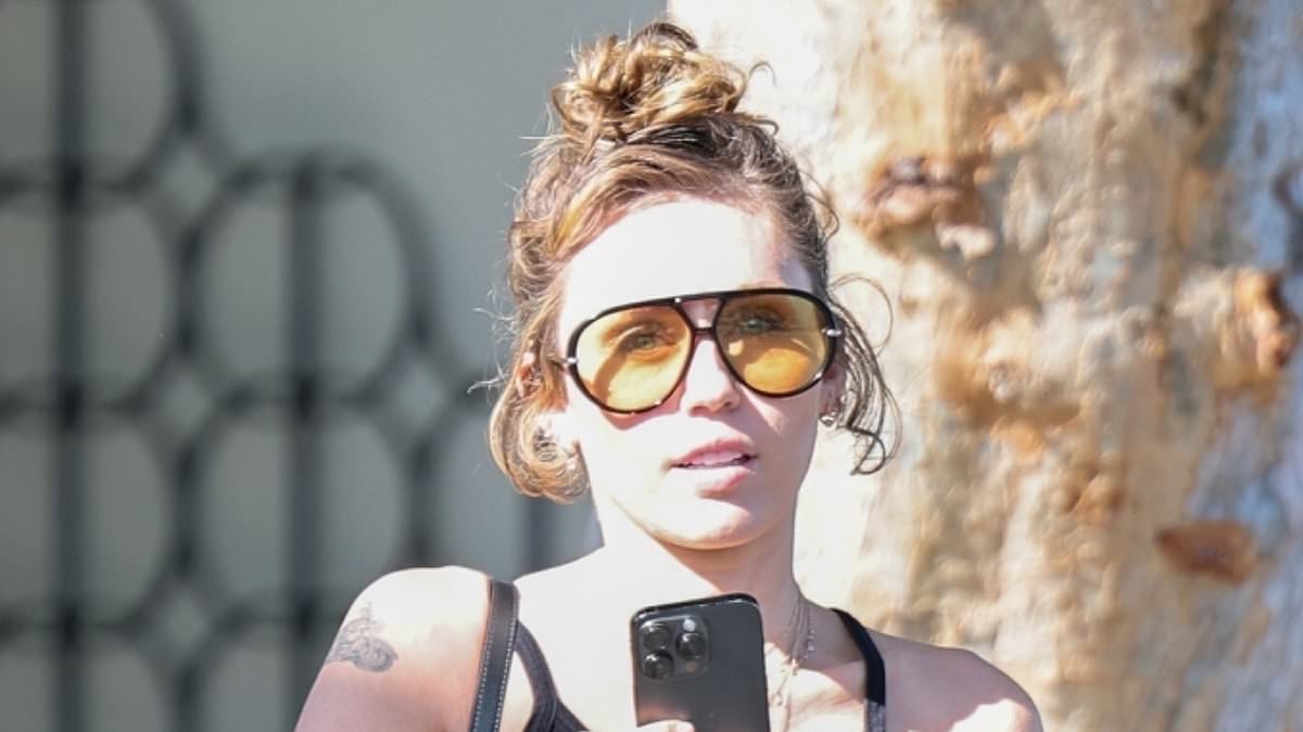 alert-–-miley-cyrus,-32,-cuts-a-casual-figure-in-a-trendy-crop-top-as-she-is-seen-for-the-first-time-since-revealing-her-traumatising-emergency-health-scare