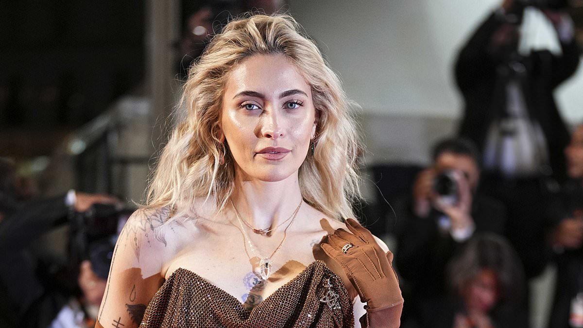 alert-–-paris-jackson-puts-on-a-very-leggy-display-in-a-brown-thigh-split-gown-as-she-joins-glamorous-margaret-qualley-at-the-honey-don’t!-premiere-during-cannes-film-festival