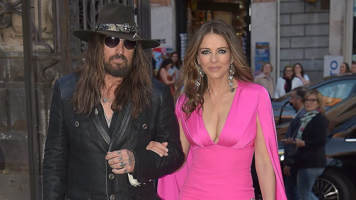 alert-–-elizabeth-hurley,-59,-and billy-ray-cyrus,-63,-put-on-a-loved-up-display-as-they-make-first-outing-as-a-couple-at-swanky-bash-in-rome-–-after-shocking-the-world-with-their-unlikely-romance