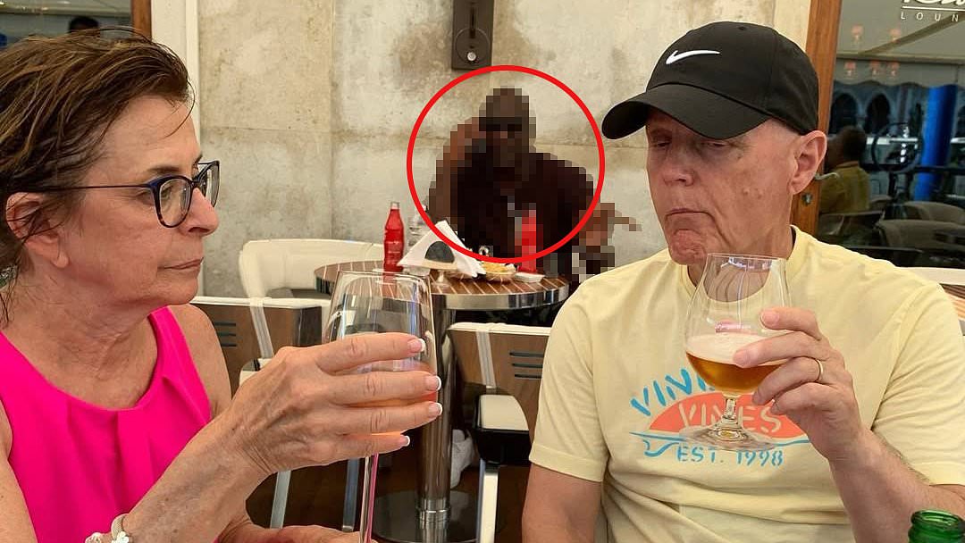 alert-–-incredible-moment-family-realize-all-time-sporting-great-is-casually-sitting-behind-them-in-vacation-photos