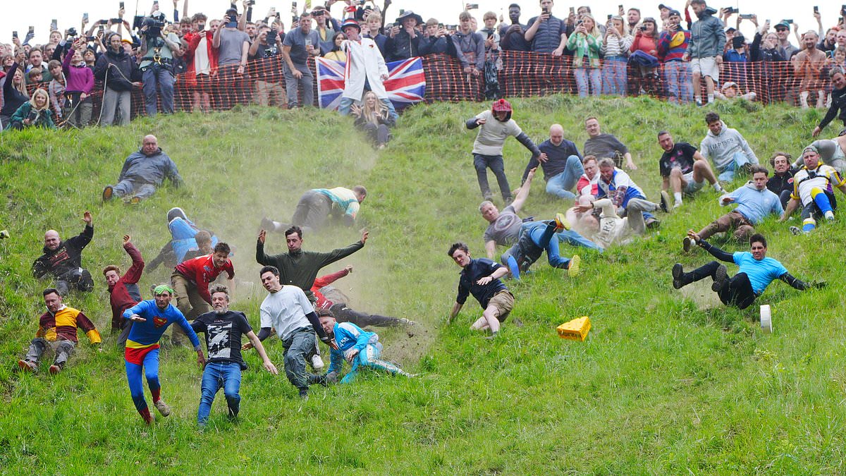 alert-–-that’s-gouda-hurt!-first-timer-who-‘doesn’t-like-cheese’-wins-women’s-cheese-rolling-race-before-punter-dressed-as-superman-rolls-to-victory-in-men’s-contest