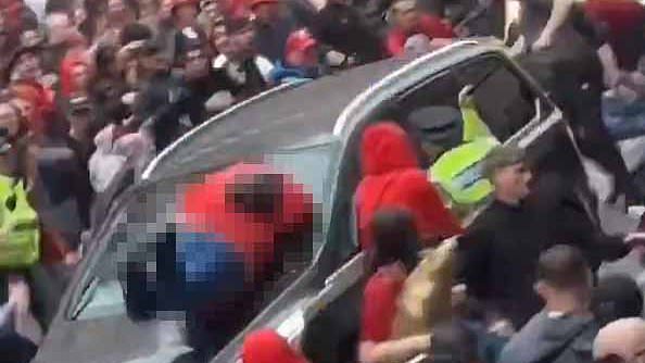 alert-–-liverpool-parade-crash:-forty-seven-hurt-including-four-children-by-driver-who-smashed-into-liverpool-parade-‘after-leaving-a-bar’:-footage-shows-white-british-suspect’s-car-being-attacked-before-30mph-rampage