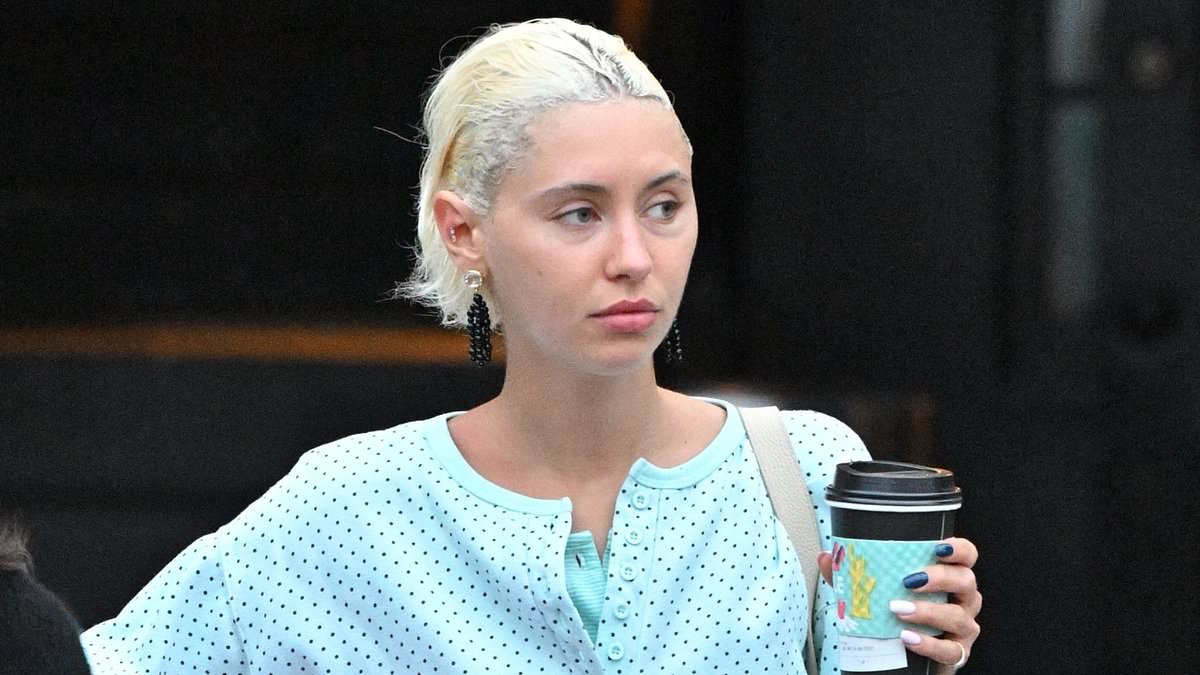 alert-–-iris-law-cuts-a-stylish-figure-in-a-pale-blue-co-ord-as-she-grabs-some-doughnuts-in-los-angeles