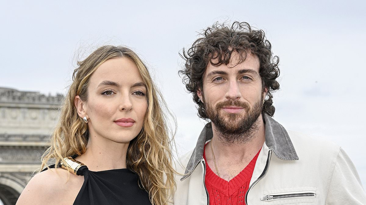 alert-–-jodie-comer-exudes-sophistication-in-draped-black-dress-as-she-joins-stylish-co-star aaron-taylor-johnson-at-photocall-for-28-years-later-in-paris