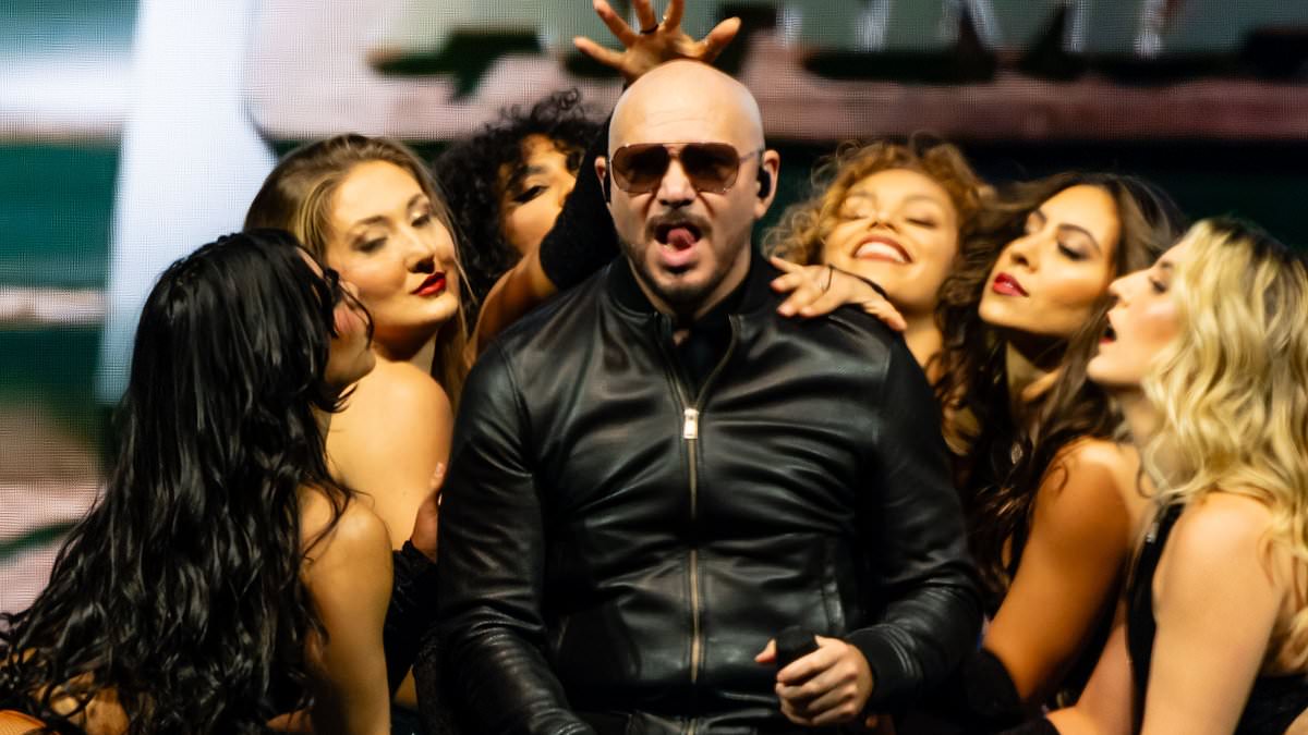 alert-–-pitbull-makes-epic-return-to-london’s-o2-with-two-more-energetic-shows-alongside-his-scantily-clad-dancers-–-as-fans-continue-tradition-of-dressing-up-as-him-for-the-concerts