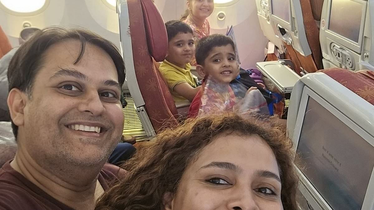 alert-–-family’s-tragic-final-selfie:-doctor-couple-and-their-children-snapped-photo-in-air-india-cabin-to-celebrate-‘new-beginnings’-just-moments-before-disaster