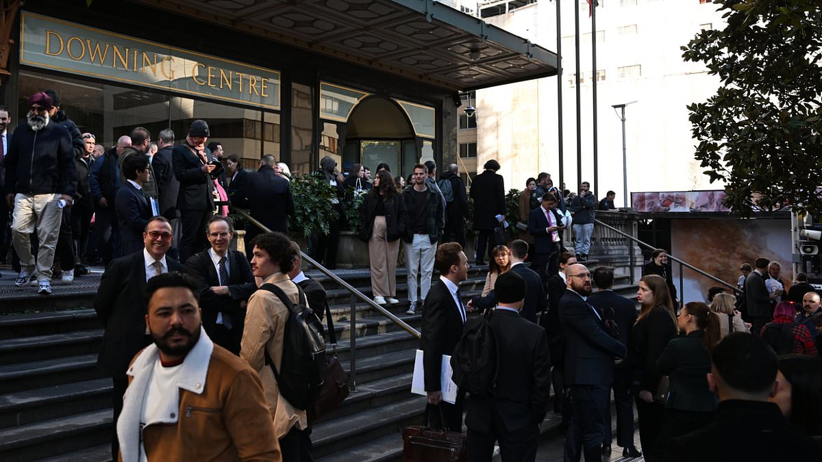 alert-–-two-people-trapped-inside-sydney’s-busiest-courthouse-after-burst-water-main-caused-massive-power-outages-across-the-city
