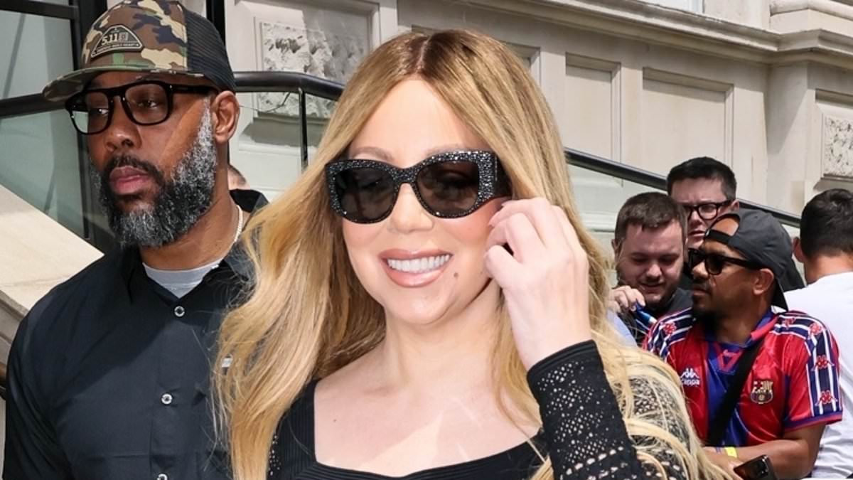 alert-–-mariah-carey-stuns-in-a-figure-hugging-black-crochet-dress-and-boots-as-she-departs-her-hotel-in-london-–-after-her-diva-demands-at-capital’s-summertime-ball-were-revealed