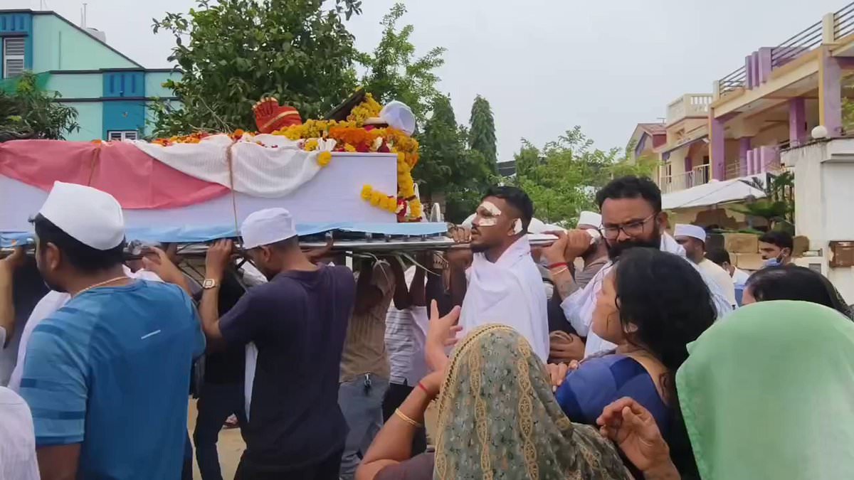 alert-–-heartbreaking-moment-british-air-india-crash-survivor-limps-as-he-carries-the-coffin-of-his-brother-who-died-next-to-him-with-240-others-on-doomed-flight