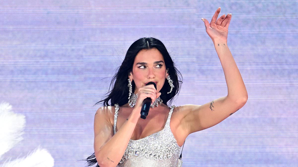alert-–-dua-lipa-stuns-in-a-sequin-bodysuit-and-fishnet-stockings-as-she’s-joined-on-stage-at-wembley-stadium-by-a-special-guest