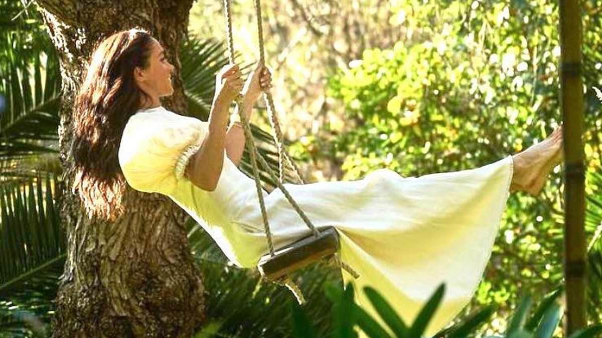 alert-–-meghan-is-accused-of-being-a-copy-kate-again:-duchess-takes-to-a-swing-to-promote-her-new-as-ever-products-in-snap-that-is-very-reminiscent-of-the-princess-of-wales