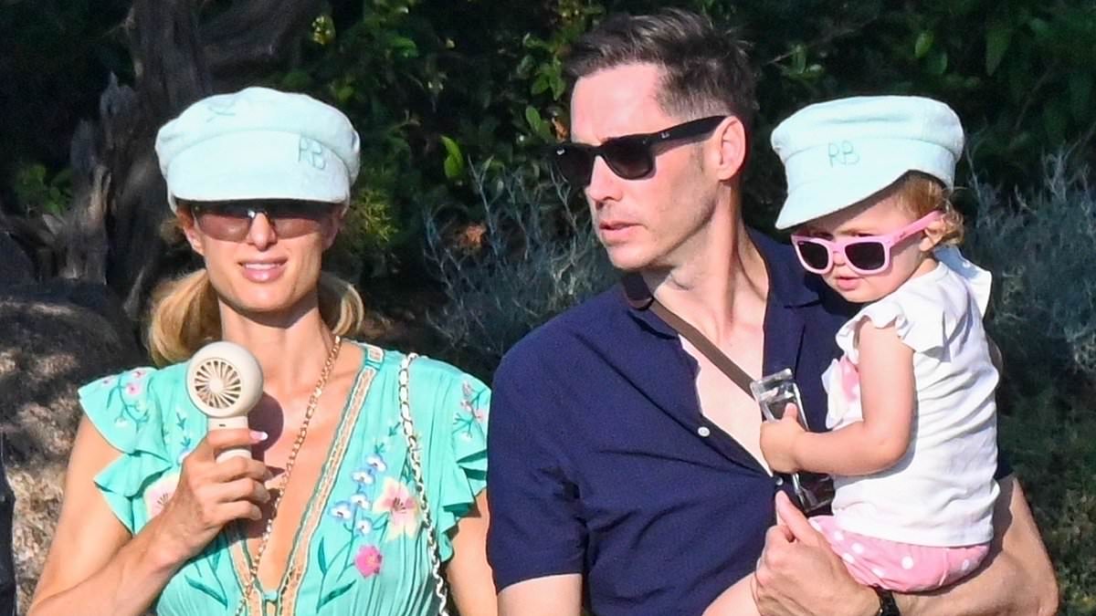 alert-–-paris-hilton-dons-low-cut-dress-as-she-treats-husband-and-kids-to-sun-soaked-luxury-yacht-vacation-in-sardinia