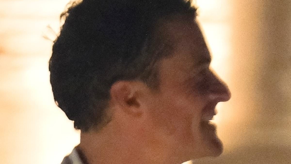 alert-–-the-pictures-that-will-break-katy-perry’s-heart:-playboy-orlando-bloom-caught-wrapping-arm-around-mystery-woman-after-bezos’-wedding-party-washout