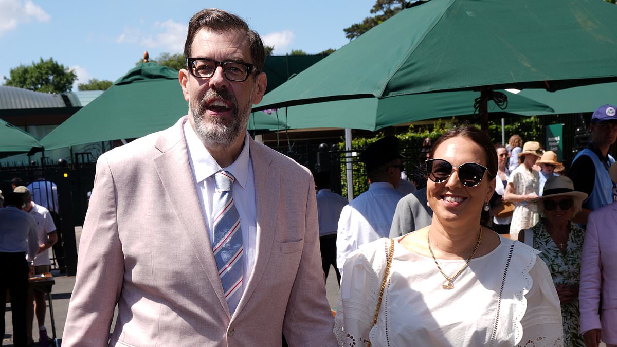 alert-–-richard-osman-and-his-wife-ingrid-oliver-hold-hands-as-they-attend-the-first-day-of-wimbledon-in-matching-pink-outfits