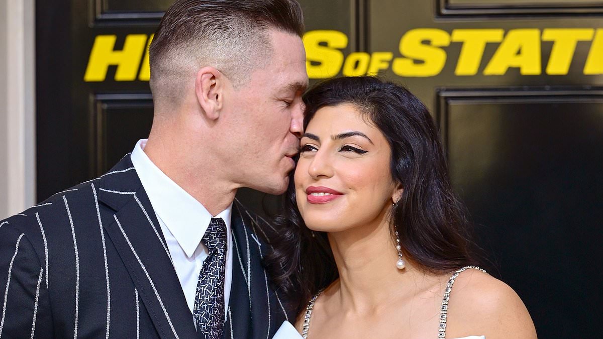 alert-–-john-cena,-48,-packs-on-the-pda-with-glamorous-wife-shay-shariatzadeh,-36,-as-couple-make-a-rare-appearance-at-heads-of-state-screening-in-london