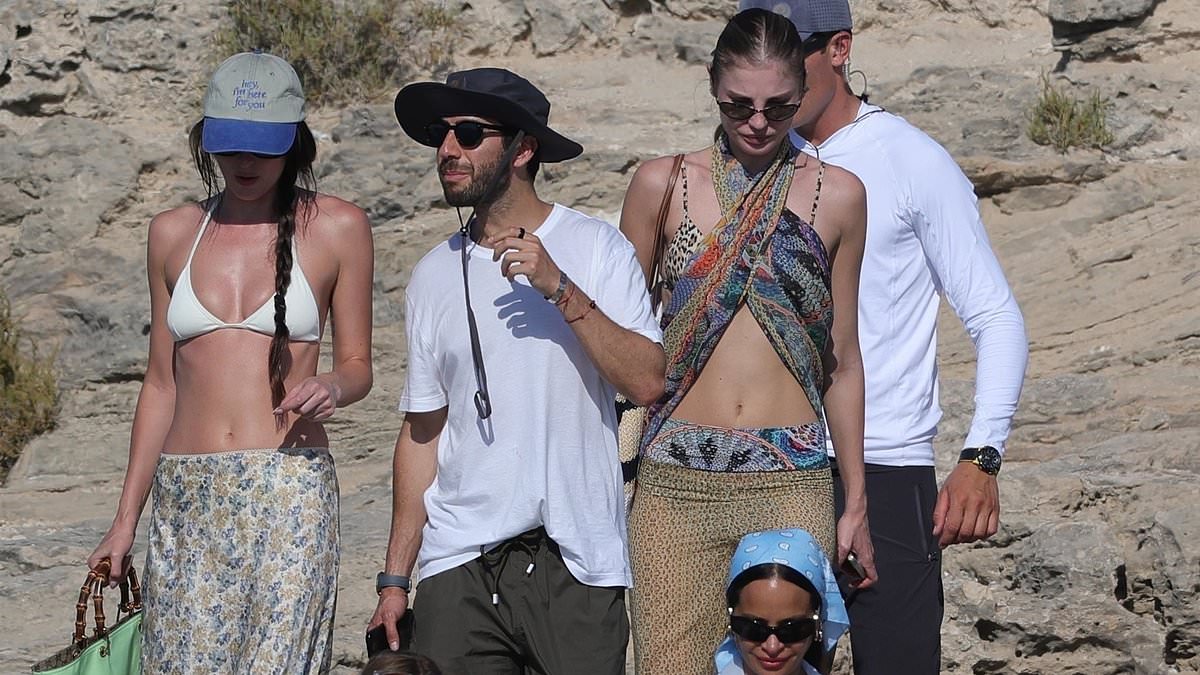 alert-–-dakota-johnson-bares-washboard-abs-with-mystery-man-in-ibiza-after-chris-martin-split