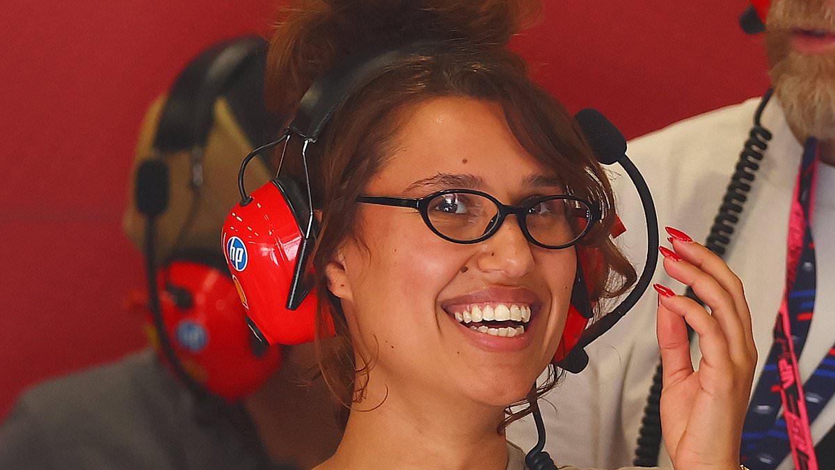 alert-–-raye-can’t-contain-her-smile-as-she-spends-the-day in-the-ferrari-garage-at-silverstone-circuit-amid-lewis-hamilton-romance-rumours