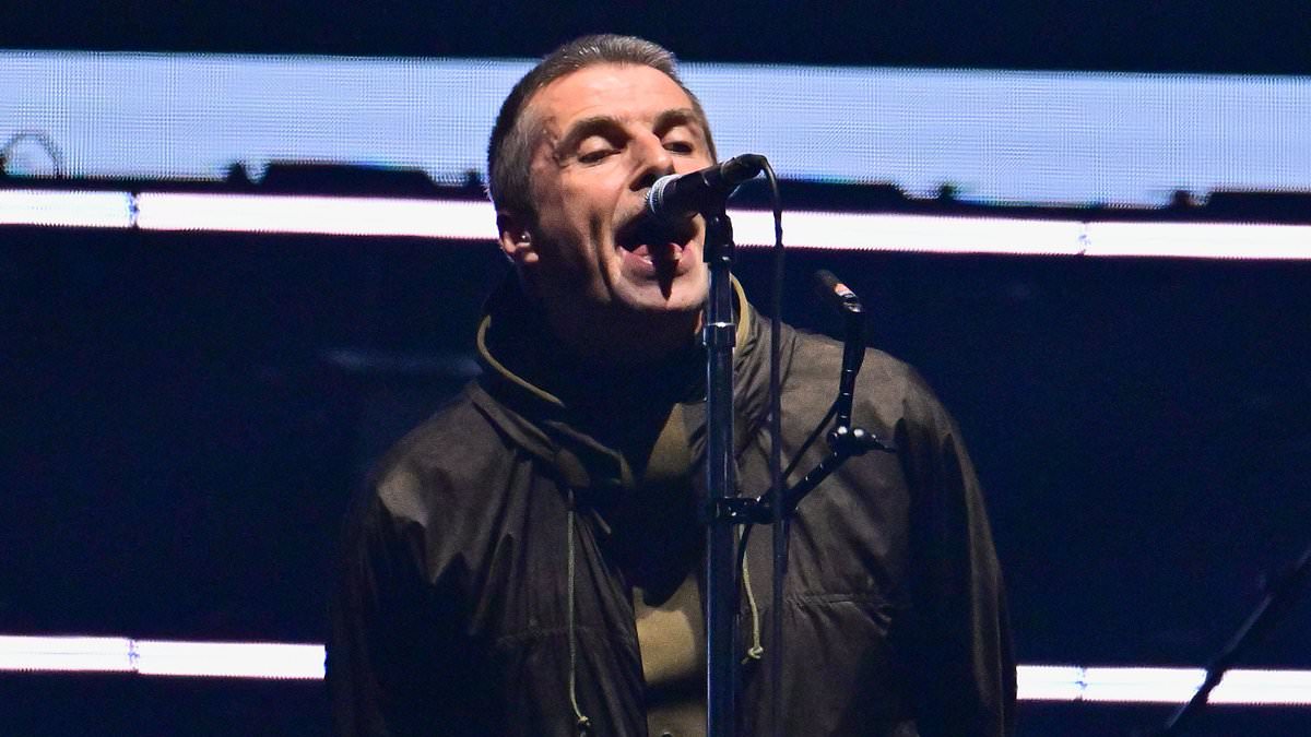 alert-–-oasis-are-back!-first-look-as-liam-and-noel-gallagher-finally-arrive-on-stage-at-cardiff’s-principality-stadium-and-put-on-very-united-display-as-they-stand-hand-in-hand-on-first-night-of-reunion-tour-–-15-years-since-split