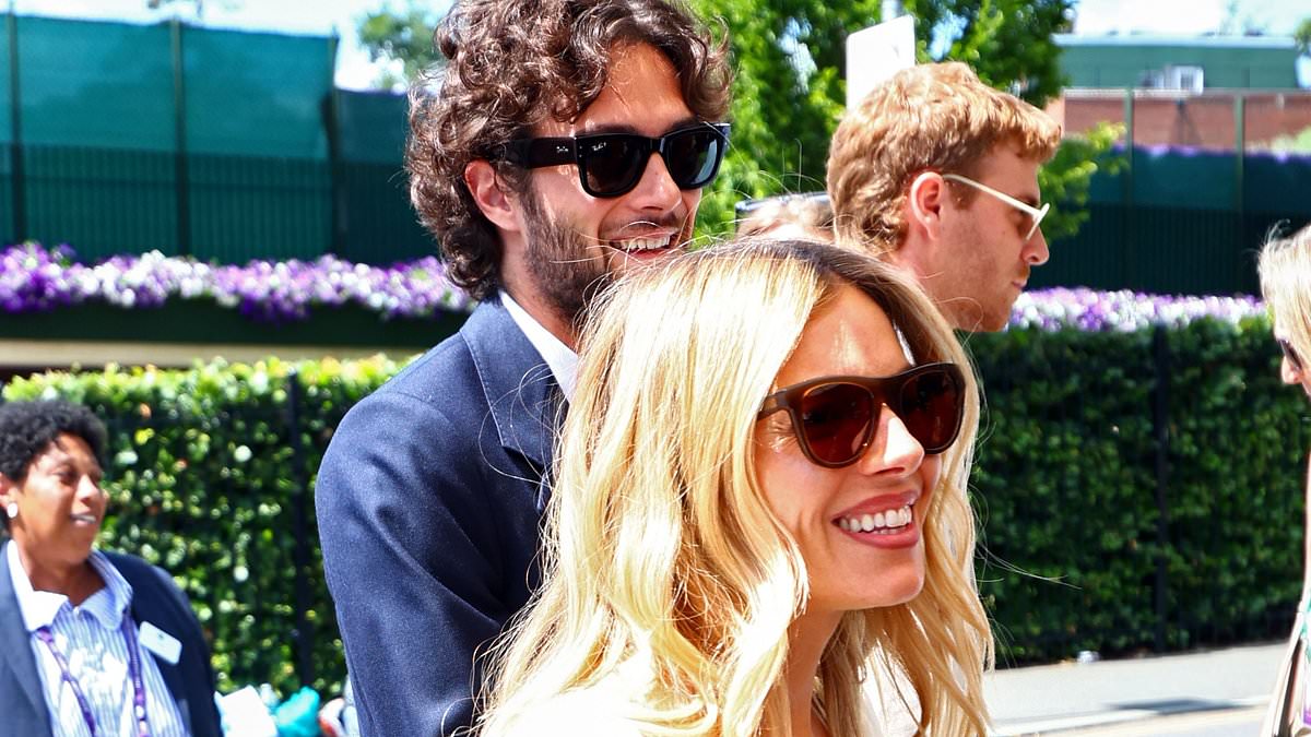alert-–-sienna-miller-leads-the-centre-court-glamour-in-a-thigh-skimming-floral-minidress-as-she-visits-sw19-with-partner-oli-green,-katherine-jenkins-and-john-and-toni-terry-on-day-nine-of-wimbledon