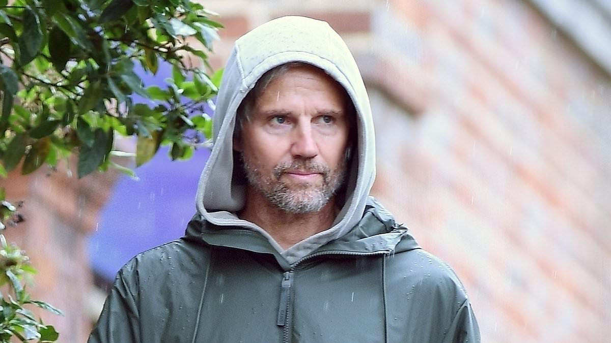 alert-–-former-take-that-star-jason-orange-keeps-a-low-profile-on-rare-public-sighting-as-he-strolls-through-rainy-london-in-a-parka-11-years-after-quitting-the-band