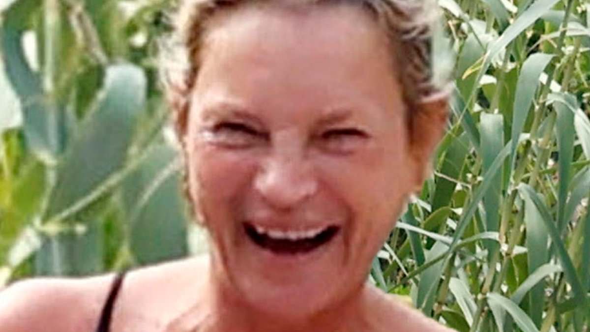 alert-–-kate-moss,-51,-flaunts-her-incredible-figure-in-a-tiny-black-bikini-as-she-guffaws-during-ibiza-beach-trip-with-lookalike-daughter-lila,-22