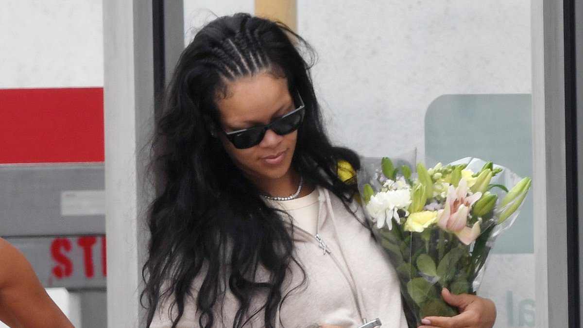 alert-–-rihanna-finds-solace-in-flowers-while-grieving-as-she-steps-off-plane-in-la-after-father’s-funeral-in-barbados