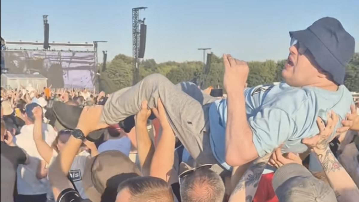 alert-–-heartwarming-video-of-disabled-oasis-fan-being-lifted-up-in-the-air-at-heaton-park-gig-by-strangers-so-he-could-see-the-gallagher-brothers-goes-viral-as-fans-are-left-in-tears