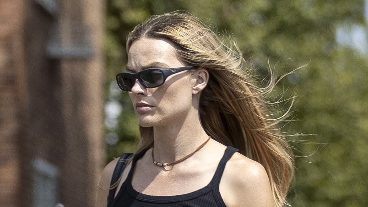 alert-–-braless-margot-robbie-steps-out-wearing-dark-sunglasses-after-living-it-up-in-ibiza-and-glastonbury