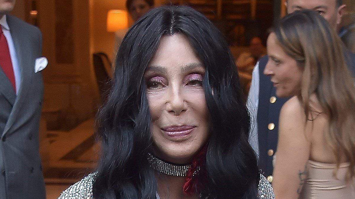 alert-–-cher,-79,-shows-off-her-ageless-visage-as-she-steps-out-of-rome-hotel-ahead-of-the-dolce-&-gabbana-show