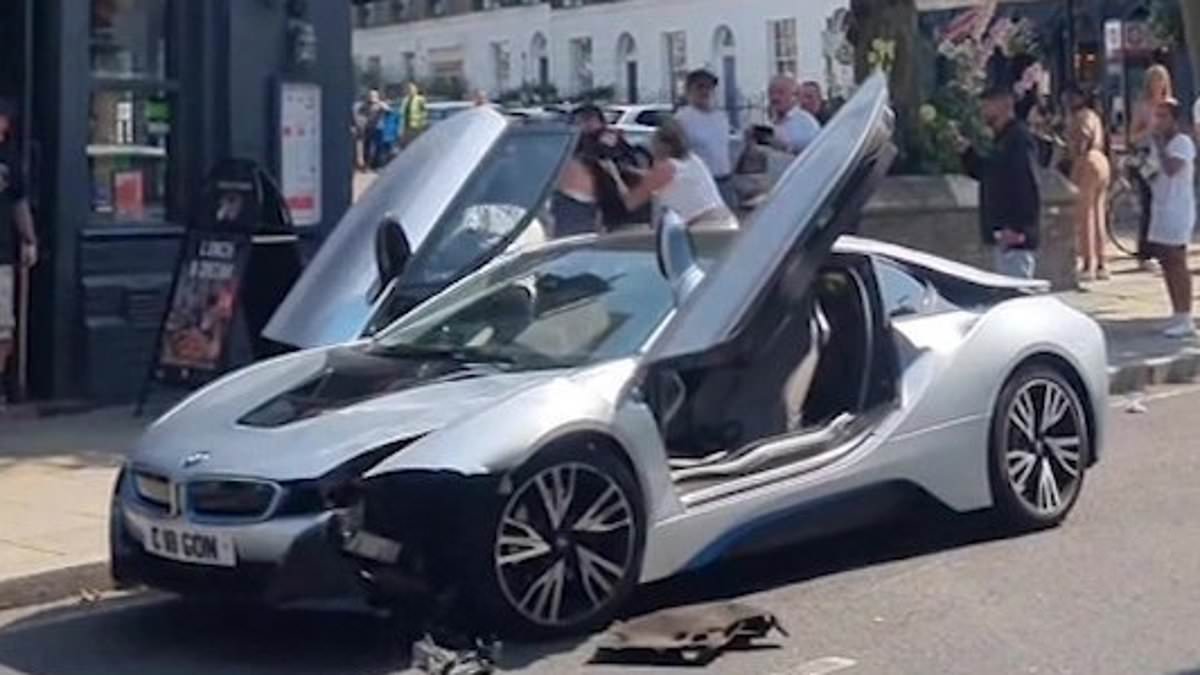 alert-–-moment-reckless-driver-sparks-street-brawl-after-crashing-her-106,000-bmw-i8-into-parked-car-on-busy-london-street