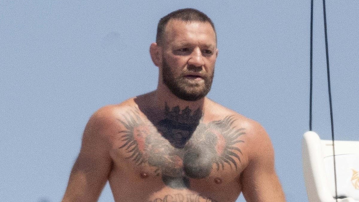 alert-–-shirtless-conor-mcgregor-shares-a-kiss-with-fiancee-dee-devlin-as-they-show-off-their-affections-on-loved-up-yacht-holiday-before-he-leers-over-her-while-sunbathing-–-amid-‘cheating’-scandal-and-‘nudes’-claims
