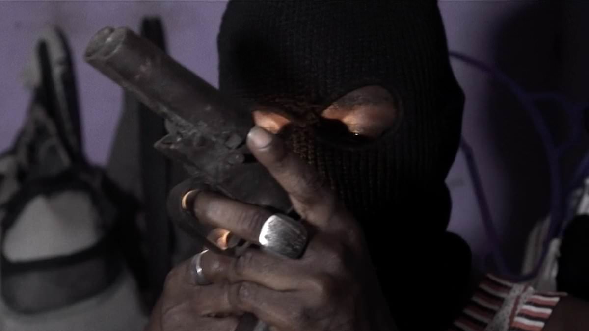 alert-–-violent-cult-that-became-the-world’s-most-feared-mafia:-the-black-axe-gang-tortures-new-recruits-in-a-naked-blood-drinking-initiation-–-now-british-teens-are-targeted-on-social-media-to-help-launder-3.8-billion-a-year