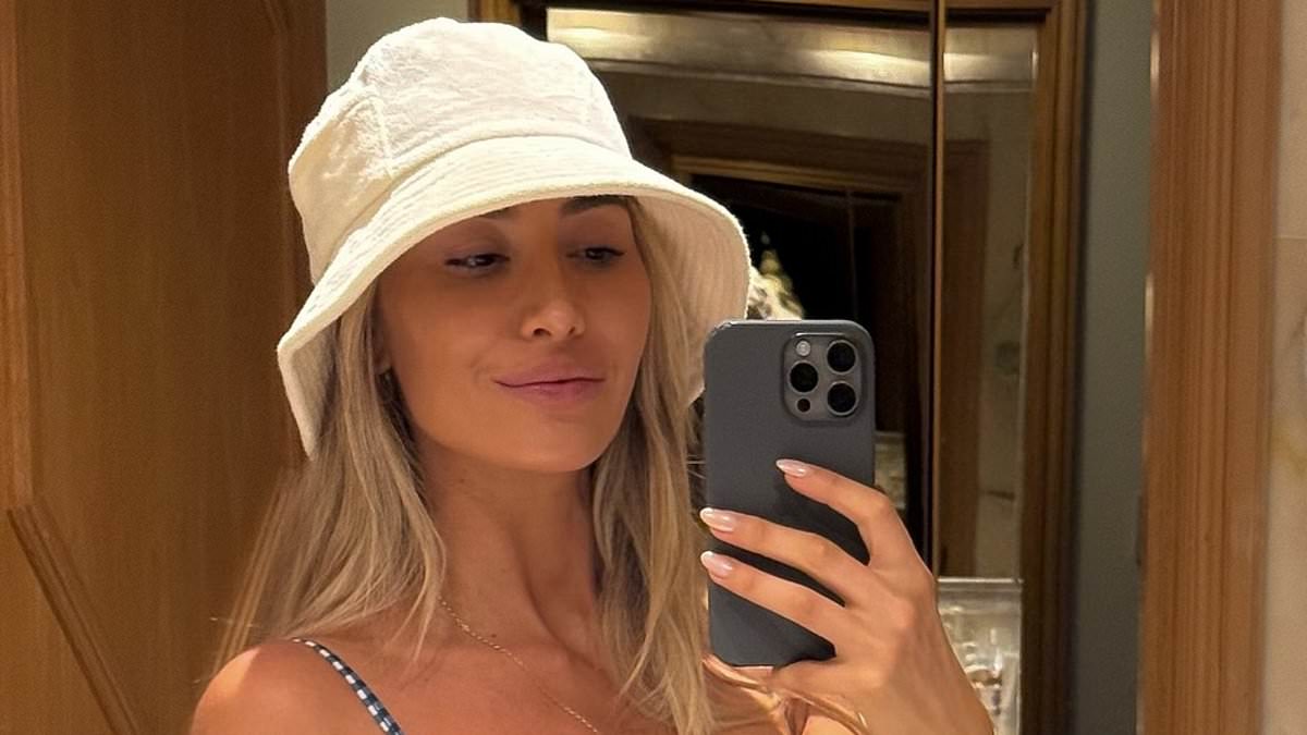 alert-–-pregnant-sophie-habboo-displays-her-growing-baby-bump-in-a-gingham-bikini-before-donning-a-chic-beach-cover-up-during-idyllic-family-holiday