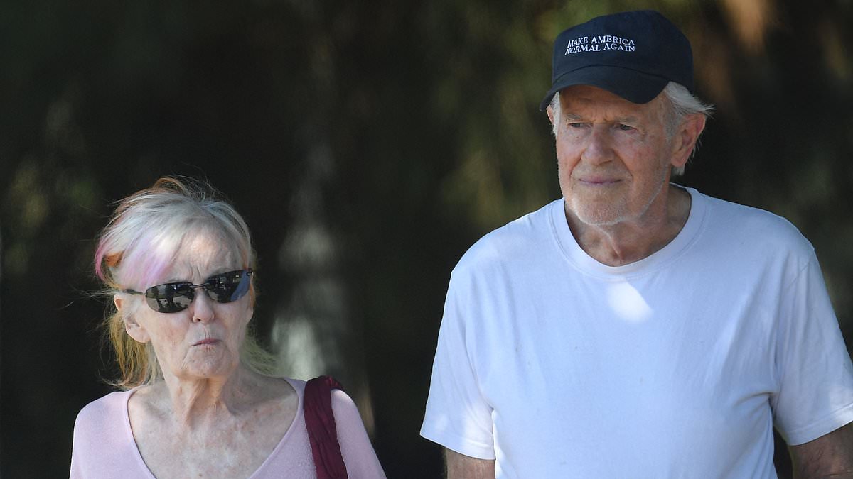 alert-–-70s-tv-icon-wears-bold-political-hat-during-rare-outing-with-actress-wife-who-famously-said-‘no’-to-elvis